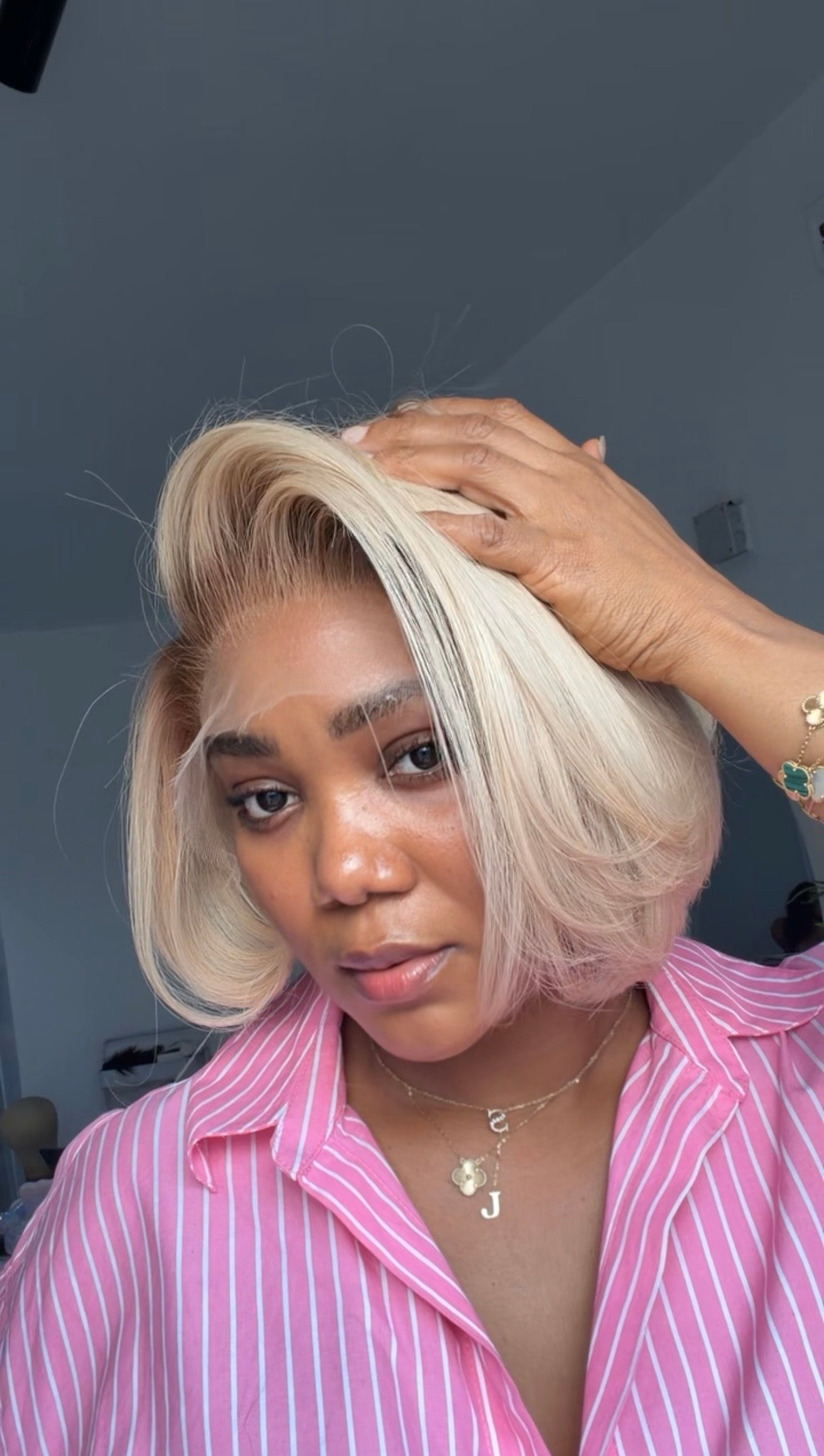 Side view of the Blonde Bob Raw Human Hair Wig featuring a 13x6 HD lace frontal, 8–10-inch bob length and silky blonde strands with a flawless, natural-looking hairline.