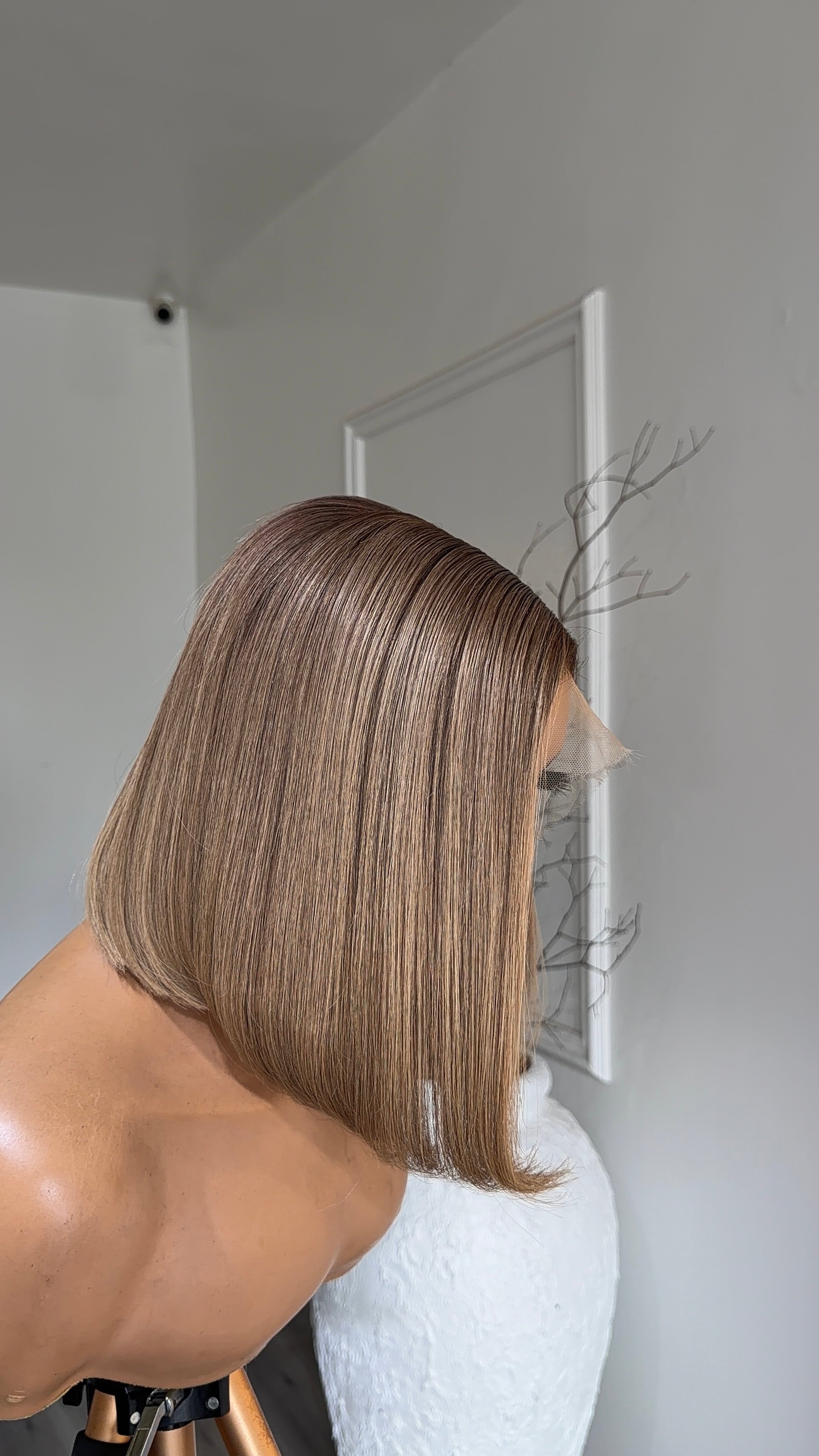 Beige Blonde Bob Raw Human Hair Wig with a 9x6 HD lace closure, 10–12-inch bob length and soft beige blonde tones, front view.