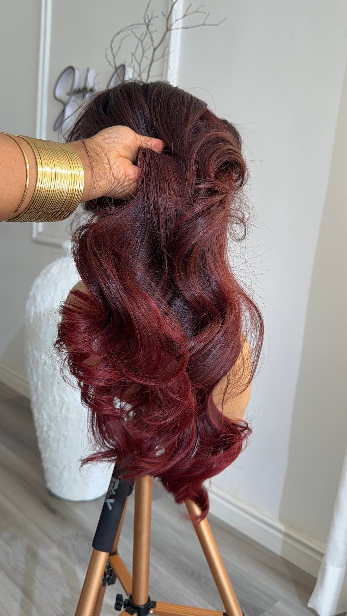Side view of the Cherry Rush Burgundy raw human hair body wave wig featuring a 13x6 HD lace frontal, 24-inch length and vibrant burgundy finish.