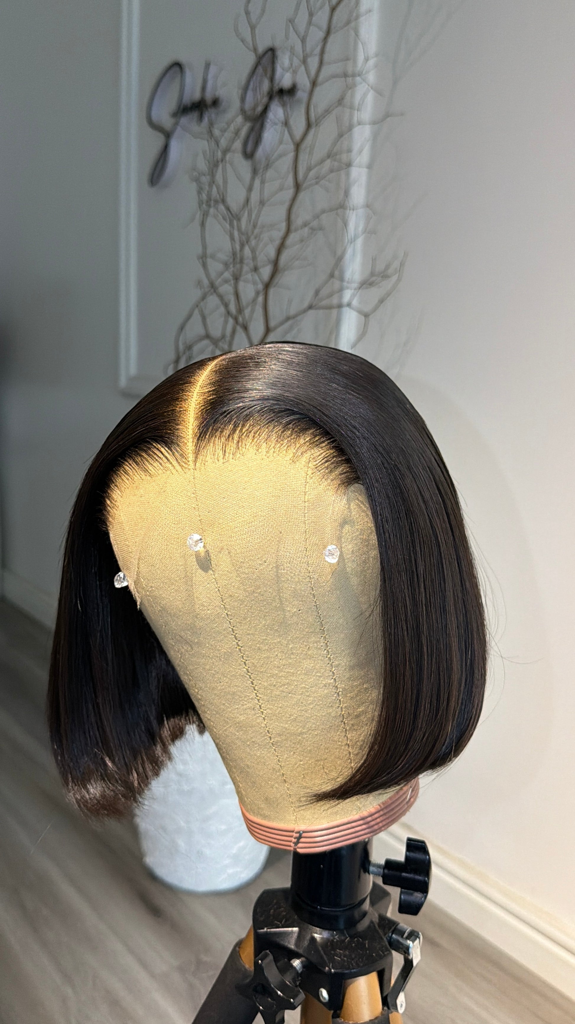 Side view of the Chic Bob raw human hair wig featuring an HD lace closure, elegant 8-inch bob cut, and a soft, natural-looking finish.
