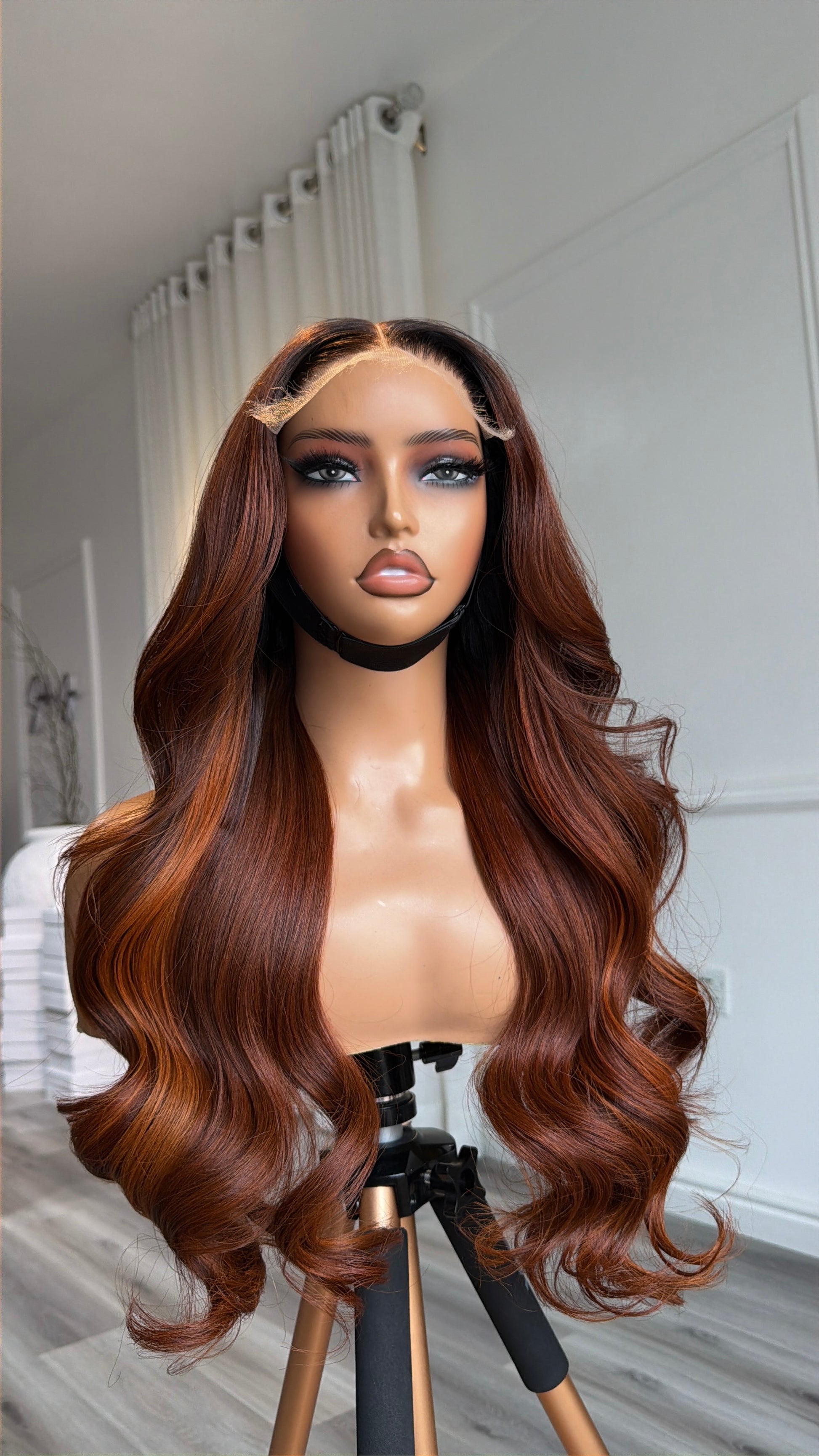 Copper Unit Raw Human Hair Wig with a 6x6 HD lace closure, 22-inch length and rich copper tones, front view.