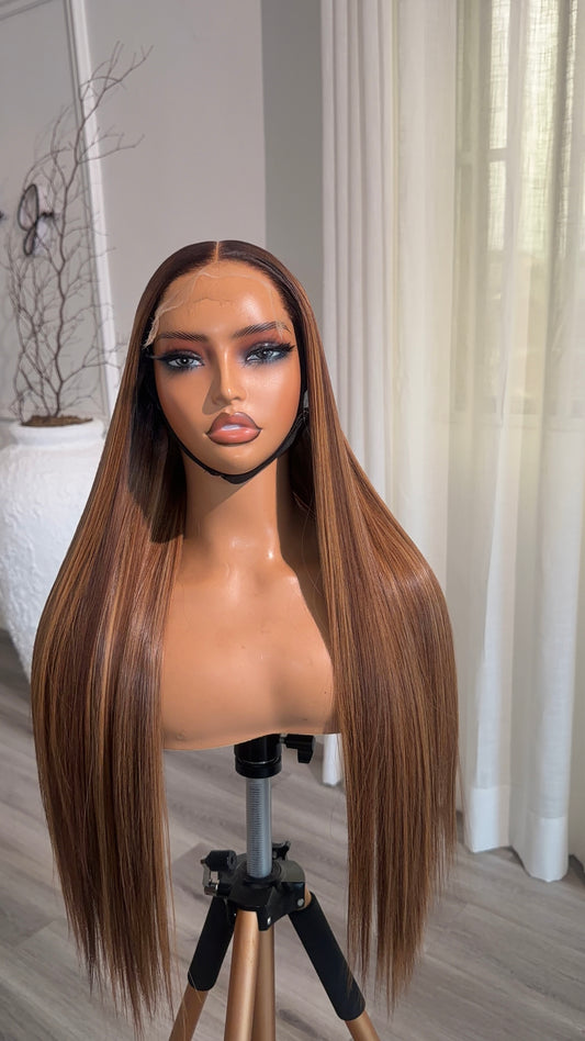 Honey Chestnut Raw Human Hair Wig with a 6x6 HD lace closure, 22-inch length and warm honey chestnut tones, front view.