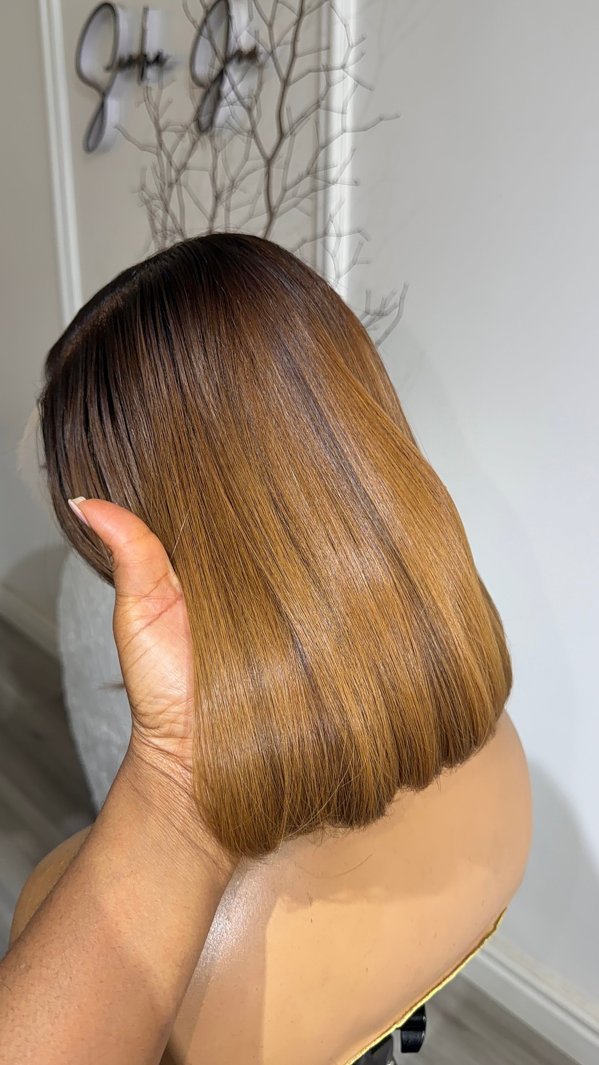 Side view of the Honey Luxe Bob raw human hair wig featuring a 9x6 HD lace closure, 10–12-inch bob cut, and a seamless natural hairline.