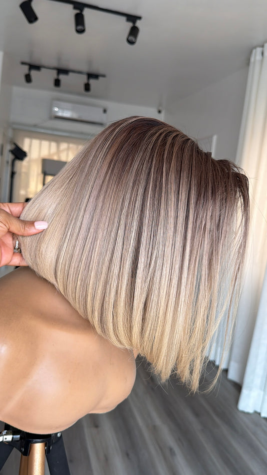 Latte Blonde Bob Raw Human Hair Wig with a 9x6 HD lace closure, 10–12-inch bob length and soft latte blonde tones, front view.