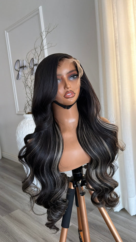 Midnight Black Wavy Raw Human Hair Wig (Salt & Pepper) with a 13x6 HD lace frontal, 26-inch length and natural salt and pepper highlights, front view.