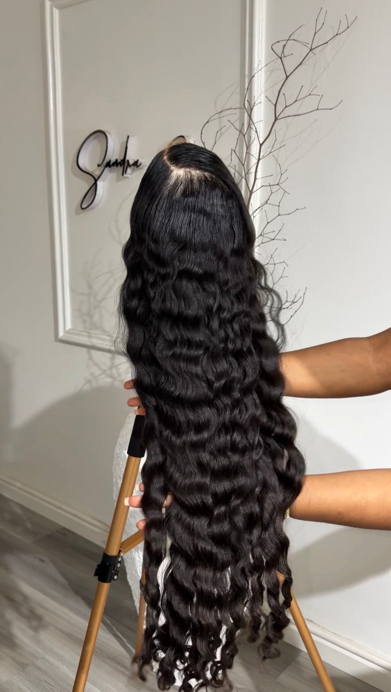 Russian Curly raw human hair wig with an HD lace closure, 28–30-inch length and defined voluminous curls, front view.