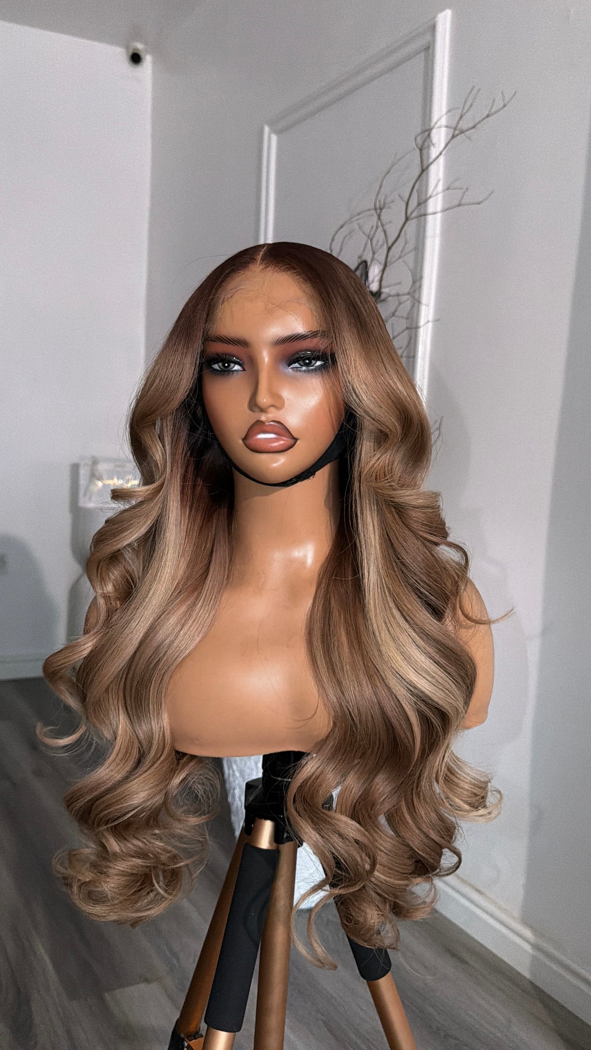 Side view of the Sandy Blonde Raw Human Hair Wig (Blonde Series) featuring a 6x6 HD lace closure, 24-inch length and silky sandy blonde strands with a seamless, natural-looking hairline.