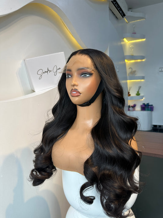 Signature Raw Wavy human hair wig with a 6x6 HD lace closure, 22-inch length and soft flowing waves, front view.