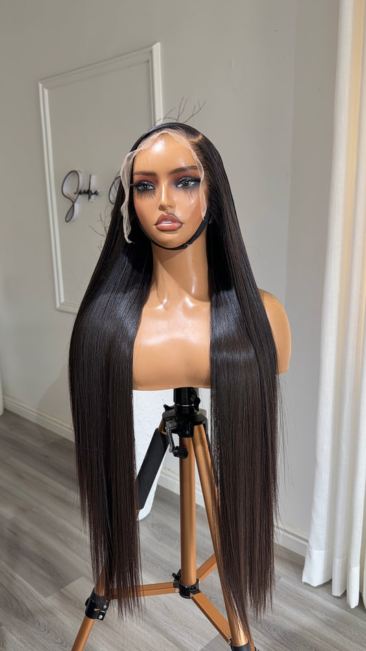 Signature Straight Raw Human Hair Wig with a 13x6 HD lace frontal, 28-inch length and sleek straight finish, front view.