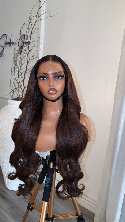 Spiced Chocolate raw human hair wig with a 6x6 HD lace closure, 24-inch length and rich chocolate brown tones, front view.
