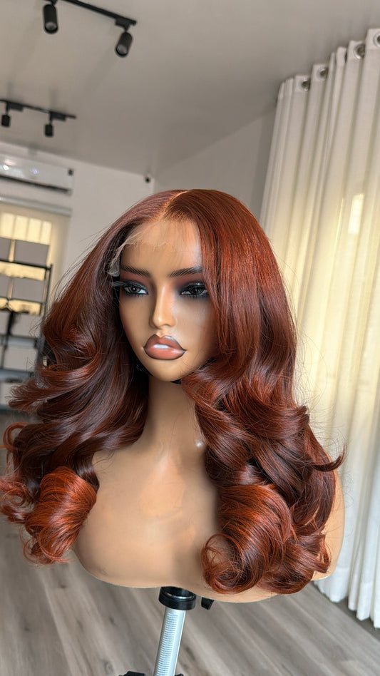 Velvet Auburn Raw Human Hair Wig with a 6x6 HD lace closure, 16–18-inch length and rich velvet auburn tones, front view.